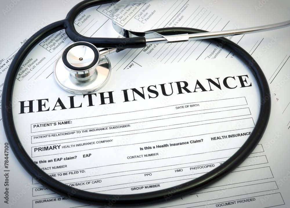 Health insurance form with stethoscope